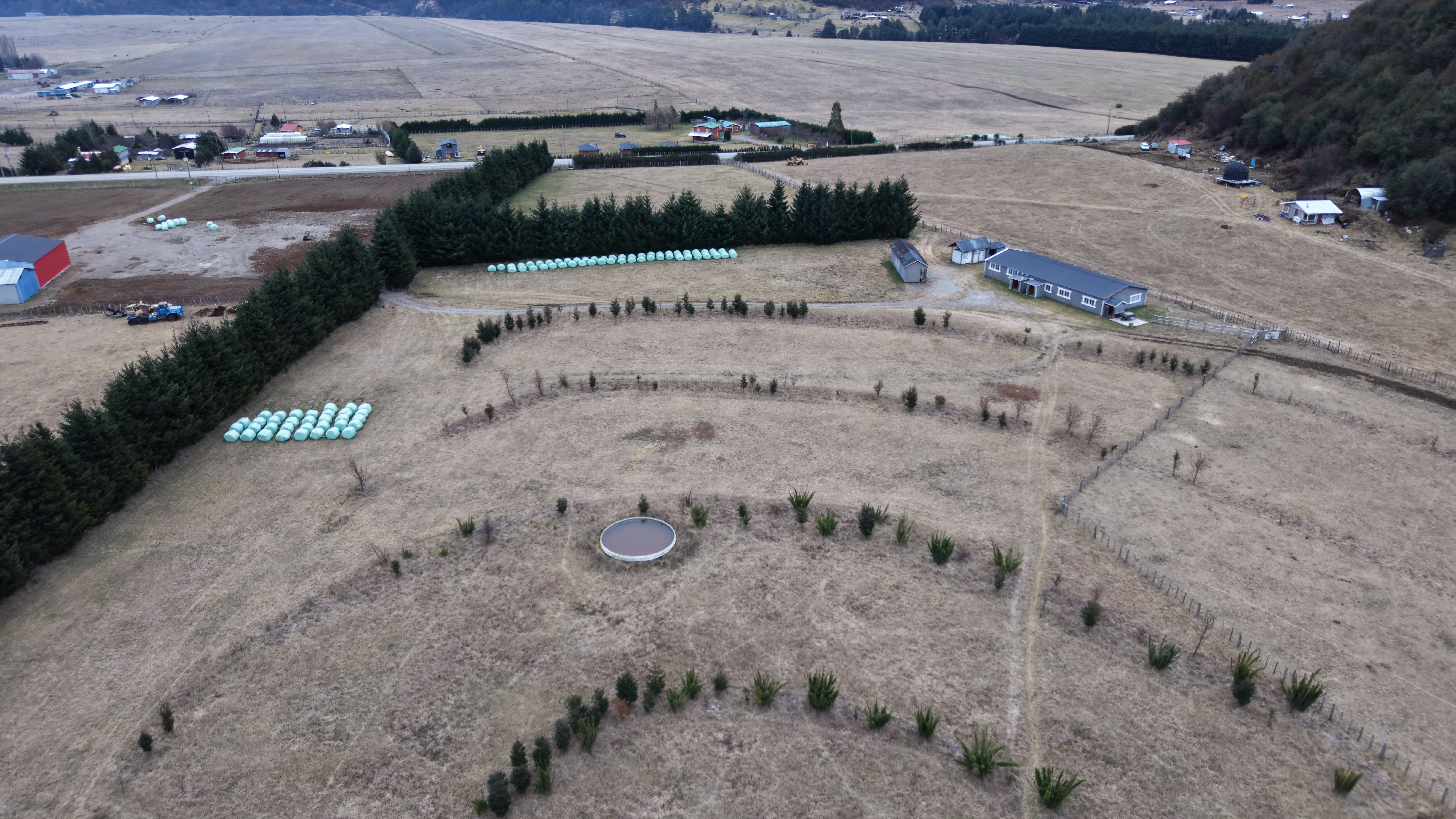 Fundo La Pampita infrastructure, sheds and silage bales, August 2026